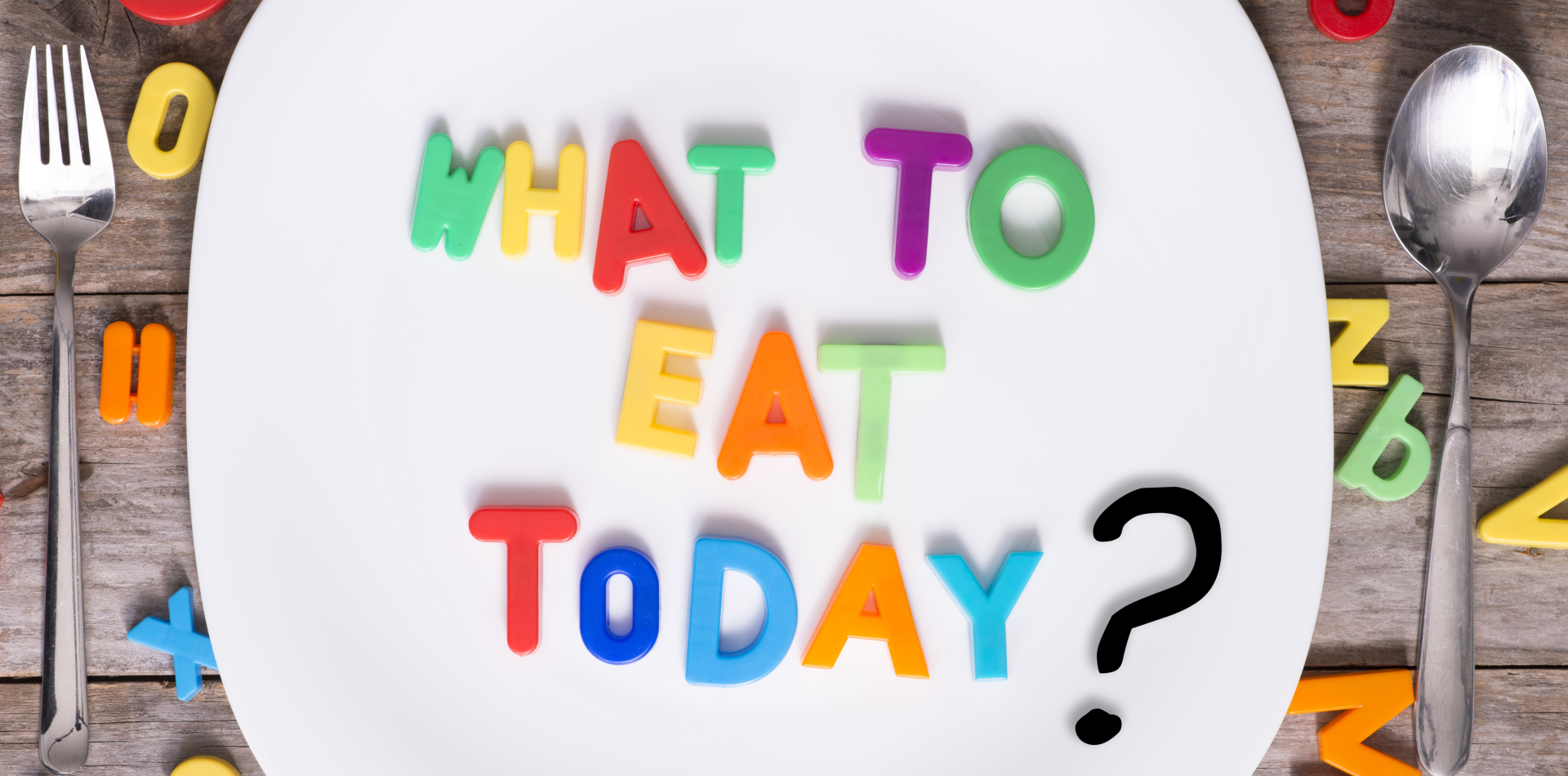 alphabets on a plate arranged as What to eat today